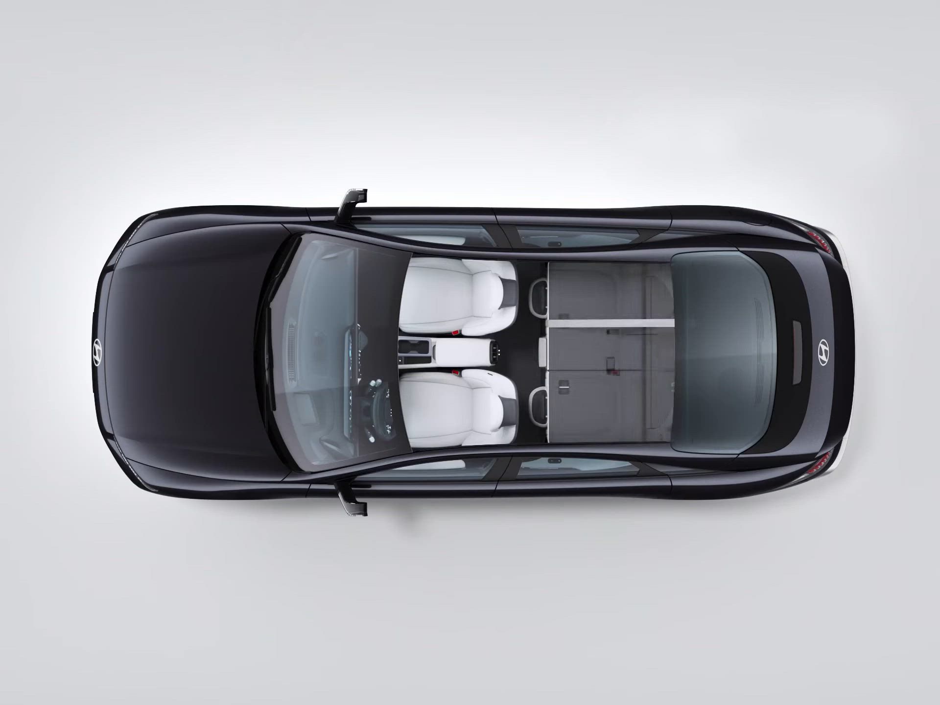 Fotografija koja iz ptičje perspektive prikazuje iznimnu prilagodljivost prostora i sjedala u modelu Hyundai IONIQ 6.
